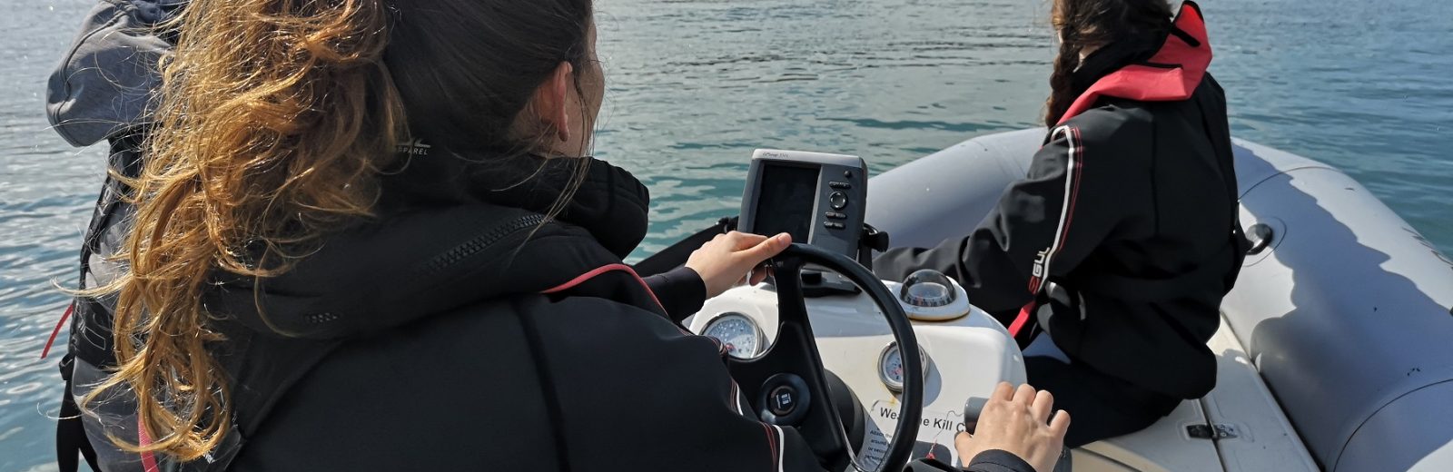 Nautical Leadership Experience Young person driving rib boat